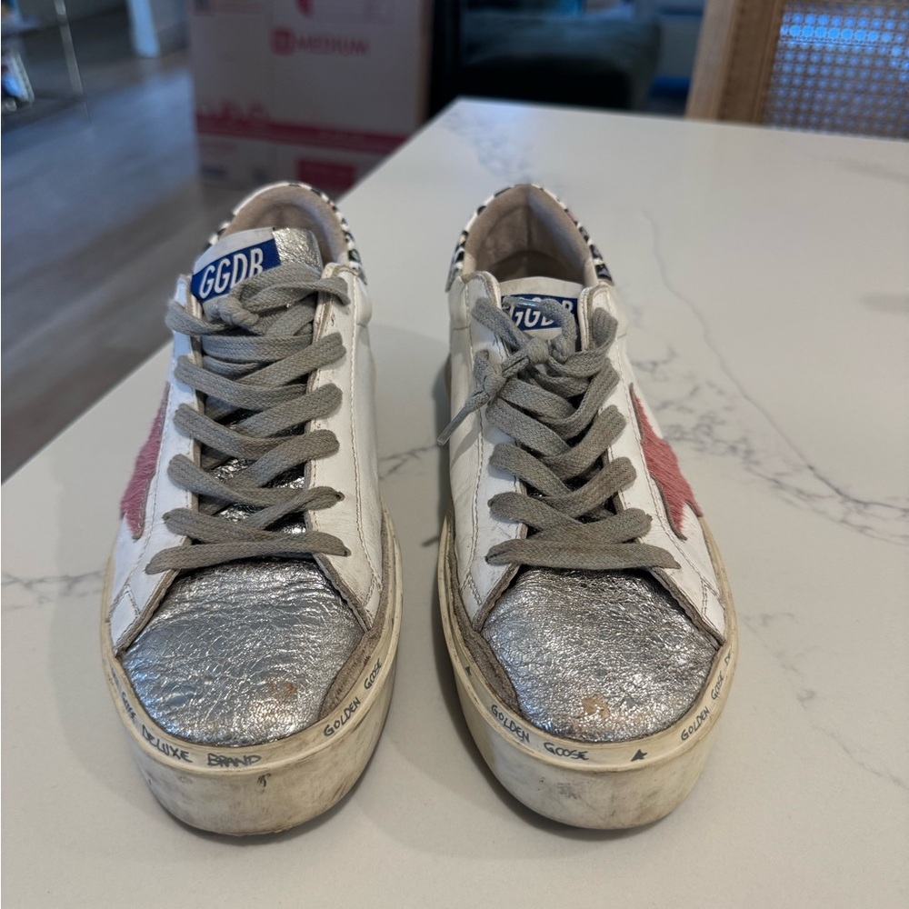 Golden goose high star sneakers